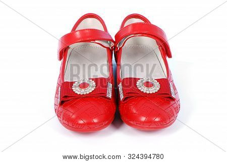 Chilren Red Shoes On White Background. High Resolution Photo. Full Depth Of Field.