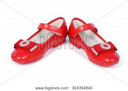 Chilren Red Shoes On White Background. High Resolution Photo. Full Depth Of Field.