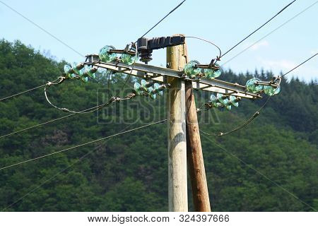 Wooden Telephone Poles And Electrical Wires And Telephone Wires