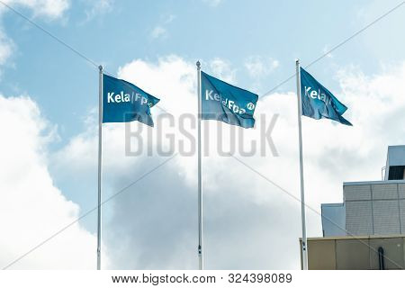 Kouvola, Finland - 22 September 2019: Flags Of Kela. Kela Is Finnish Social Insurance Institution.