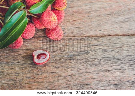 Fresh Litchi Fruit On An Old Wooden Background