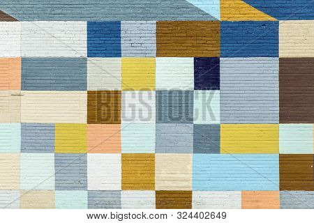 Old Historic Brick Wall Painted In Rainbow Colors