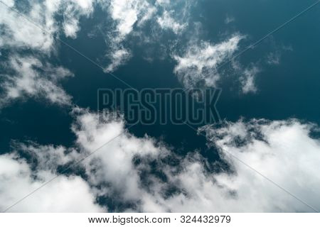 Blue Sky Background With Clouds. Sunny Day