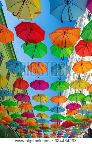 Colorful Umbrellas Hanging Over The Old Streets Of Timisoara City Center, Romania. Photo Taken On 20