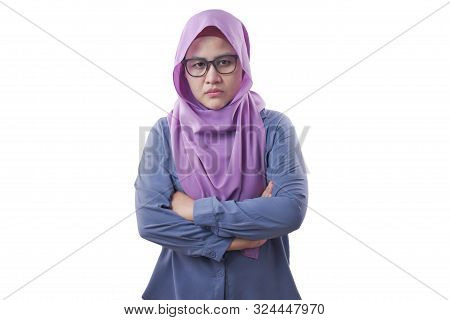 Portrait Of Angry Cynical Asian Muslim Woman With Suspicious Expression Looking At Camera, Mistrust 