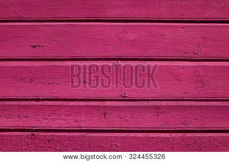 Bright Fuchsia Pink Wooden Wall Texture Background. Old Fence Close Up