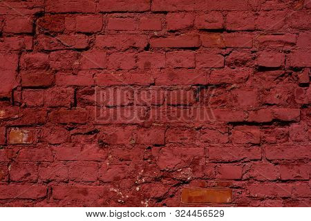 Red Brick Wall Texture Background. Old Weathered And Cracked Red And Orange Bricks With White Paint 