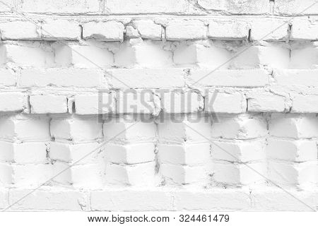 White Brick Wall Texture Background. Old Brick Wall With Beautiful Pattern And Broken Bricks
