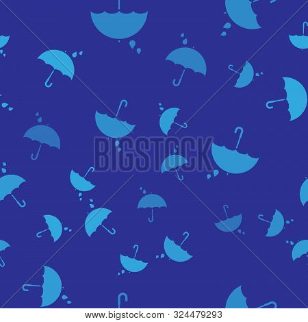 Blue Umbrella And Rain Drops Icon Isolated Seamless Pattern On Blue Background. Waterproof Icon. Pro