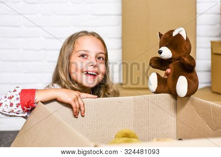 Delivering Happiness. Little Child Open Post Package With Toys. Deliver Your Treasures. Storage For 