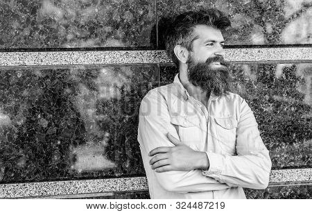 Beard Grooming. Man Attractive Bearded Hipster Posing Outdoors. Masculinity And Manliness. Confident