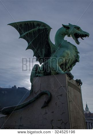Statue Of The Dragon On Dragon Bridge In Ljubljana, Slovenia