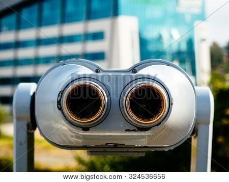 Binoculars On The City Observation Deck For Tourists. Sightseeing With Binoculars. City View