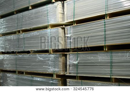 Goods With Wrapping And Stacked Inside The Warehouse