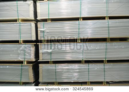 Goods With Wrapping And Stacked Inside The Warehouse