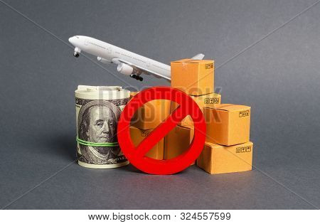 The Prohibition Sign No Blocks, Bundle Of Dollars Money And Boxes With A Airplane. Embargo, Trade Wa