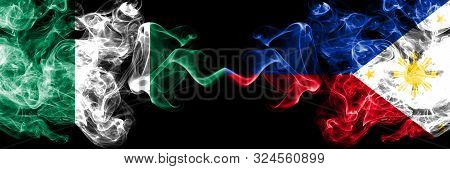 Nigeria Vs Philippines, Filipino Abstract Smoky Mystic Flags Placed Side By Side. Thick Colored Silk