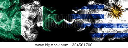 Nigeria Vs Uruguay, Uruguayan Abstract Smoky Mystic Flags Placed Side By Side. Thick Colored Silky S