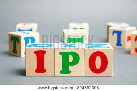 Wooden Blocks With The Word Ipo (initial Public Offering; Stock Market Launch). The First Public Sal