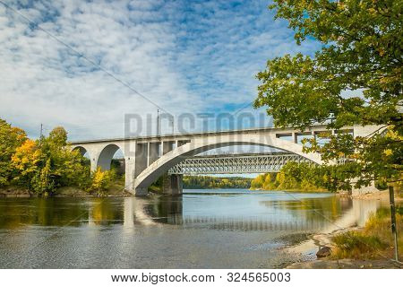 Kouvola, Finland - 25 September, 2019: Autumn Landscape Of Bridge And Kymijoki River Waters In Finla