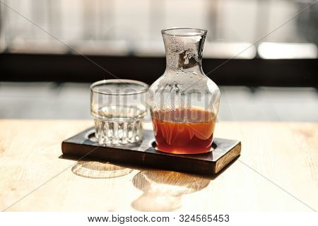 On The Table Is A Jar Of Alternative Coffee And A Glass. Hario V60. Concept Filter Coffee