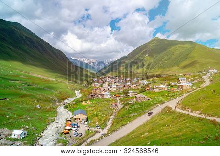 View Of The Ushguli Village At The Foot Of Mt. Shkhara. Picturesque And Gorgeous Scene. Rock Towers