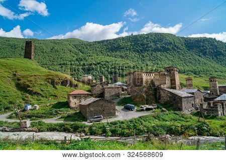 View Of The Ushguli Village At The Foot Of Mt. Shkhara. Picturesque And Gorgeous Scene. Rock Towers