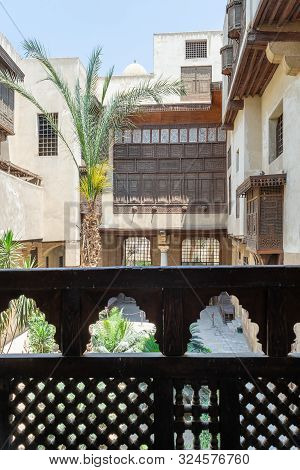 Patio Of Ottoman Era Beit El Sehemy Historic Building Framed By Wooden Decorated Balustrade, Moez St