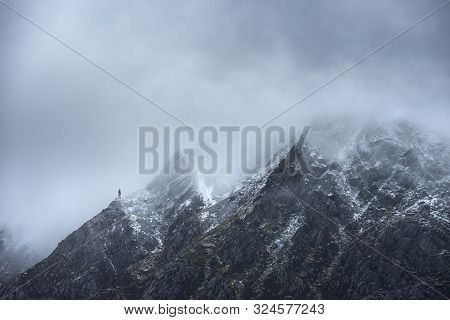 Stunning Detail Landscape Images Of Snowcapped Pen Yr Ole Wen Mountain In Snowdonia During Dramatic 