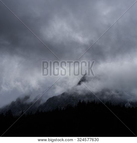 Stunning Detail Landscape Images Of Snowcapped Pen Yr Ole Wen Mountain In Snowdonia During Dramatic 