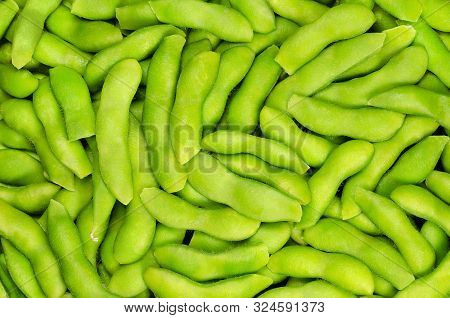 Edamame, Green Soybeans In The Pod, Background. Unripe Soya Beans, Also Maodou. Glycine Max, A Legum