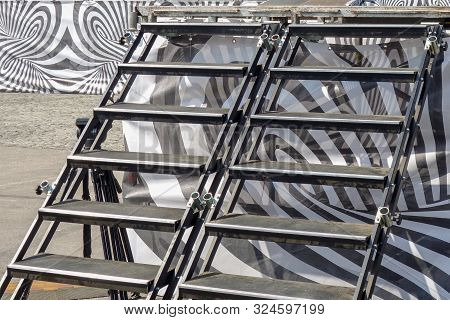 Ladder With Steps To A Stage Or Podium Platform. Metal Stairs Of Portable Construction Closeup Image