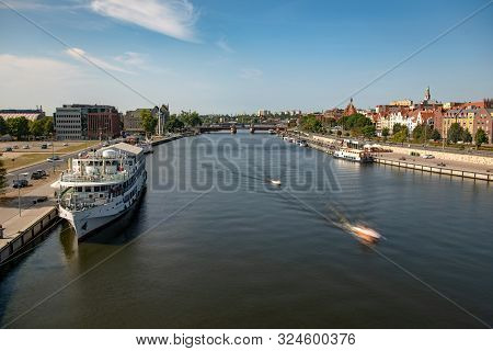 Left Bank Of The Oder River In Szczecin With The Maritime Museum And The Terraces With A Part Of Gro