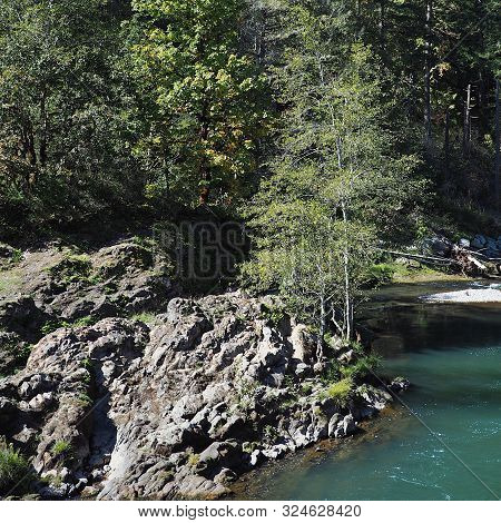 The Rocky And Rugged Shores Of The Middle Fork Of The Willamette River Near Oakridge Oregon Filled W