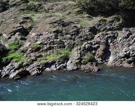 The Rocky And Rugged Shores Of The Middle Fork Of The Willamette River Near Oakridge Oregon Filled W