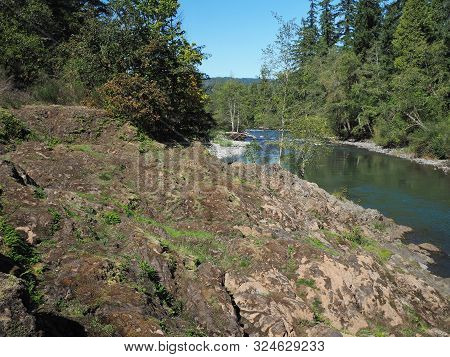 The Rocky And Rugged Shores Of The Middle Fork Of The Willamette River Near Oakridge Oregon Filled W