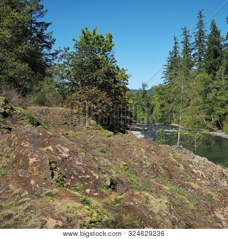 The Rocky And Rugged Shores Of The Middle Fork Of The Willamette River Near Oakridge Oregon Filled W