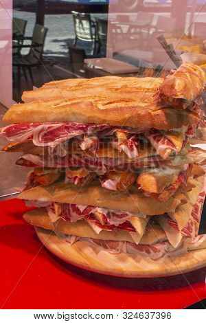 Spanish Tapas Street Food, Bocadillo Fresh Bread With Jamon Ready To Eat