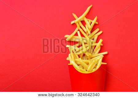 French Fries Spilled Out Of The Fry Box