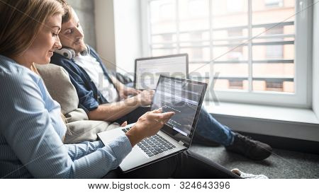 Developing Programming And Coding Technologies. Website Design. Programmer Working In A Software Dev