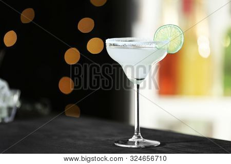 Fresh Alcoholic Cocktail With Lemon And Sugar On Bar Counter