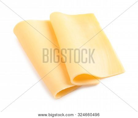 Slices Of Tasty Cheese On White Background