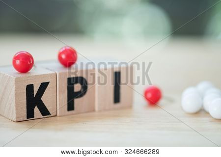 Letter Block In Word Kpi (abbreviation Of Key Performance Indicator). Metric Or Measurement To Achie