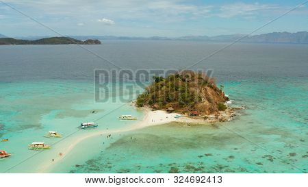 Aerial Seascape Tropical Island And Sand Beach, Turquoise Water And Coral Reef. Malacory Island, Phi