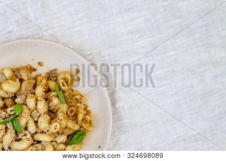 Traditional Soviet Russian Pasta Dish, Vermicelli, Navy Pasta, With Meat On A White Plate On A Light