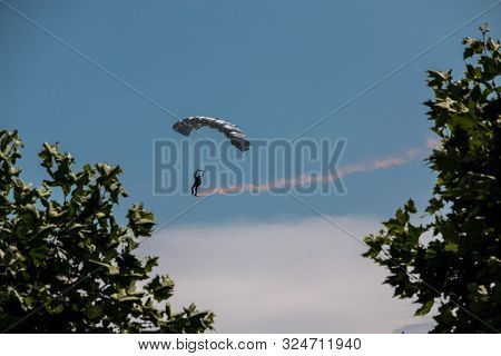 German Skydiver In The Air With German Flag