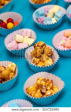 Caramel Corn  Snack Cups On A Table With Shallow Depth Of Field