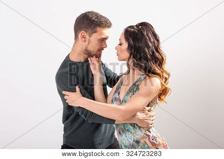 Passionate Couple Dancing Social Danse Kizomba Or Bachata Or Semba Or Taraxia On White Background Wi