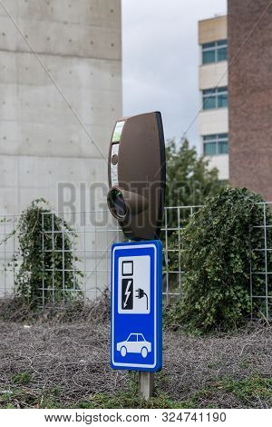 Amsterdam, Schiphol-rijk, The Netherlands, 09/27/2019, Electric Vehicle Charging Station. Eco-friend
