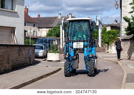 France Lyon 2019-06-20 Winemaking Equipment, Vineyard Harvesting Machine, Blue Tractor Faupin Bobard